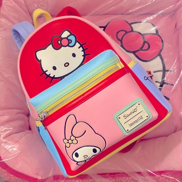 Hello Kitty Handbags - NEW Hello Kitty Loungefly mini backpack & more